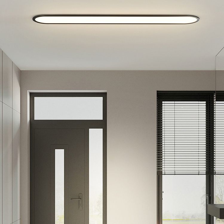 Bedroom modern oval LED flush mount ceiling light, sleek profile, offers soft, ambient glow.