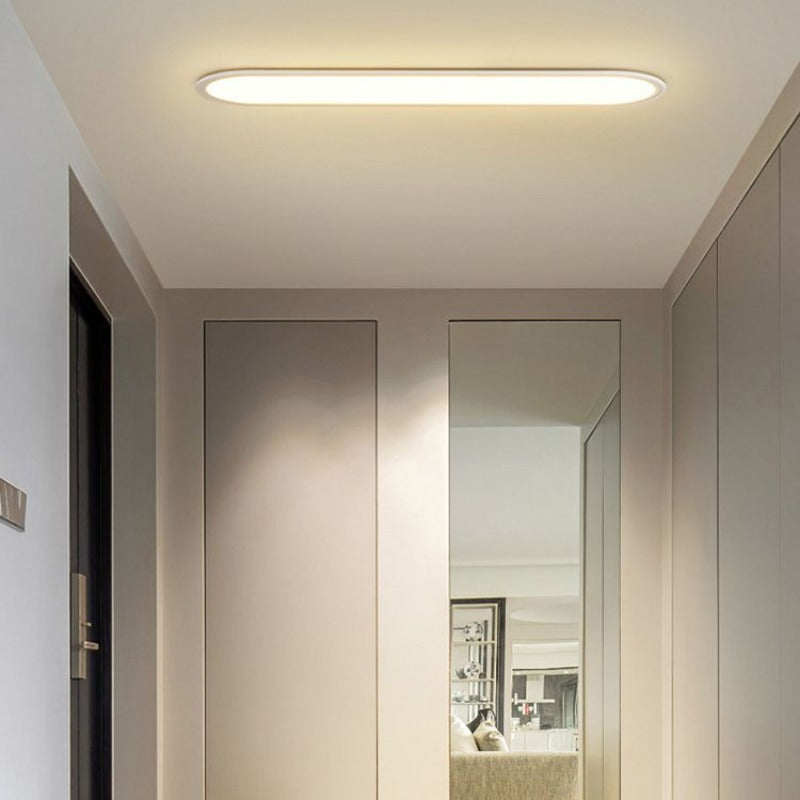 Living room modern oval LED flush mount ceiling lamp, sleek design for bright, ambient light.