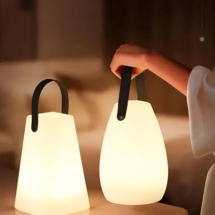 Unisex portable remote control lamp, waterproof & rechargeable for seamless indoor/outdoor glow.