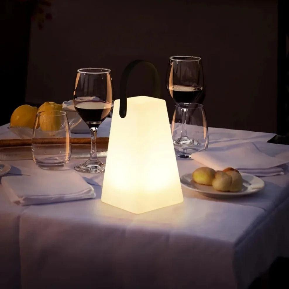 Rechargeable outdoor lighting solution: a waterproof cordless lamp with remote functionality.