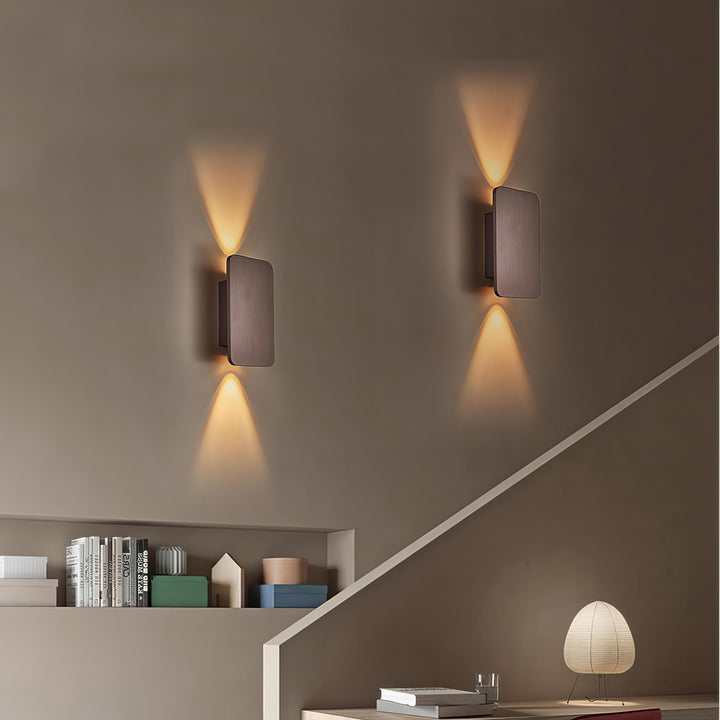 Sleek silver rectangular LED wall light, modern office or minimalist decor.