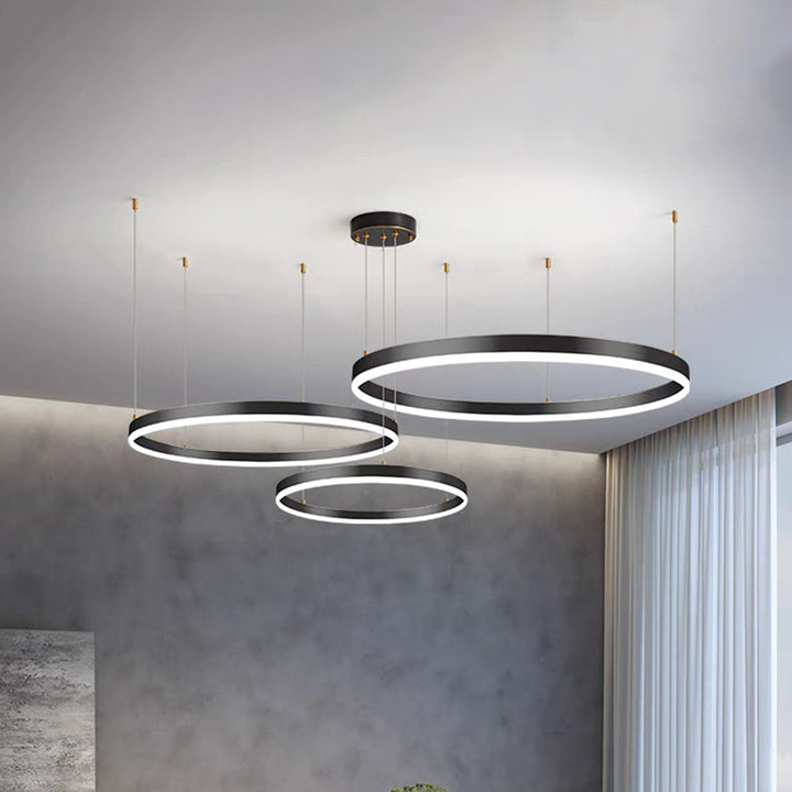 Chic LED ring ceiling fixture, enhancing living room brightness.