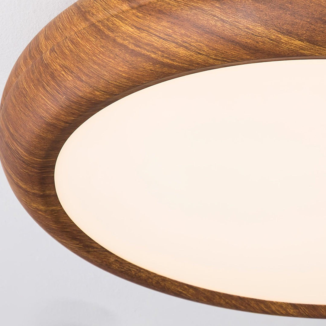Wood grain round LED flush mount ceiling light, contemporary, energy-efficient.