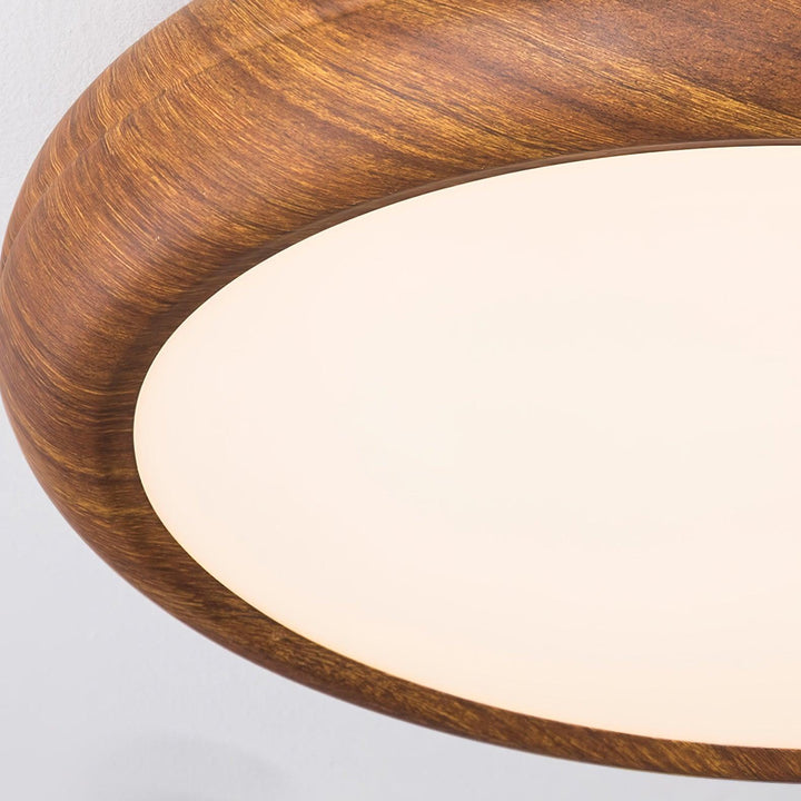 Wood grain round LED flush mount ceiling light, contemporary, energy-efficient.