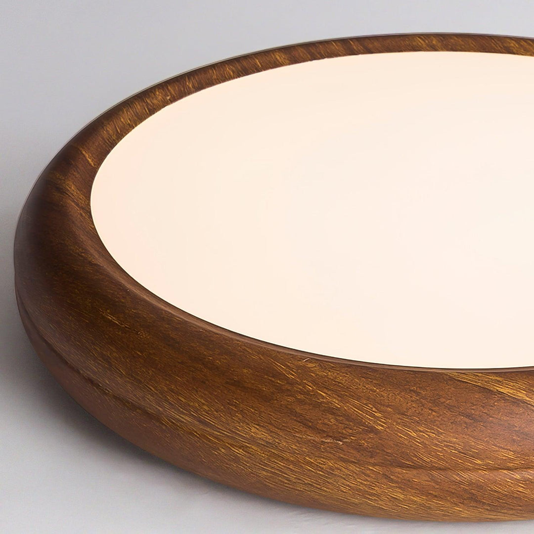 Modern LED flush mount, round, wood grain, offering dimmable warm and cold light.