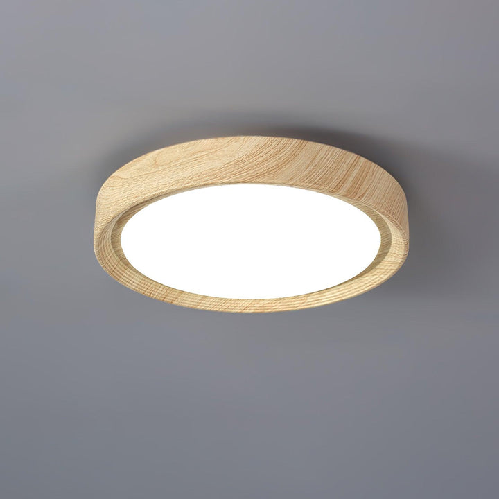 Modern round LED ceiling light, flush mount, energy-efficient, with wood grain.