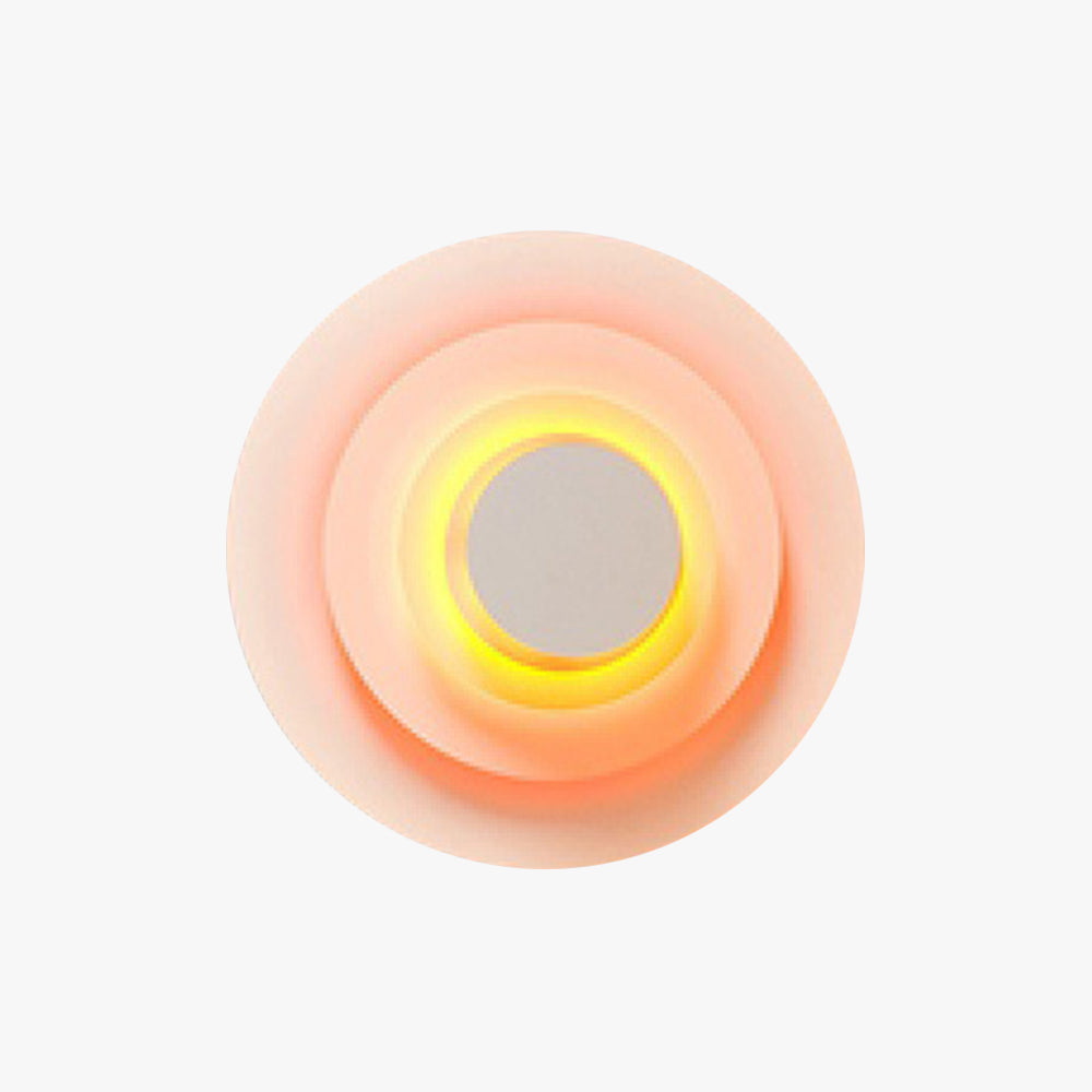 Modern round LED wall light for indoor home decor and accent lighting.