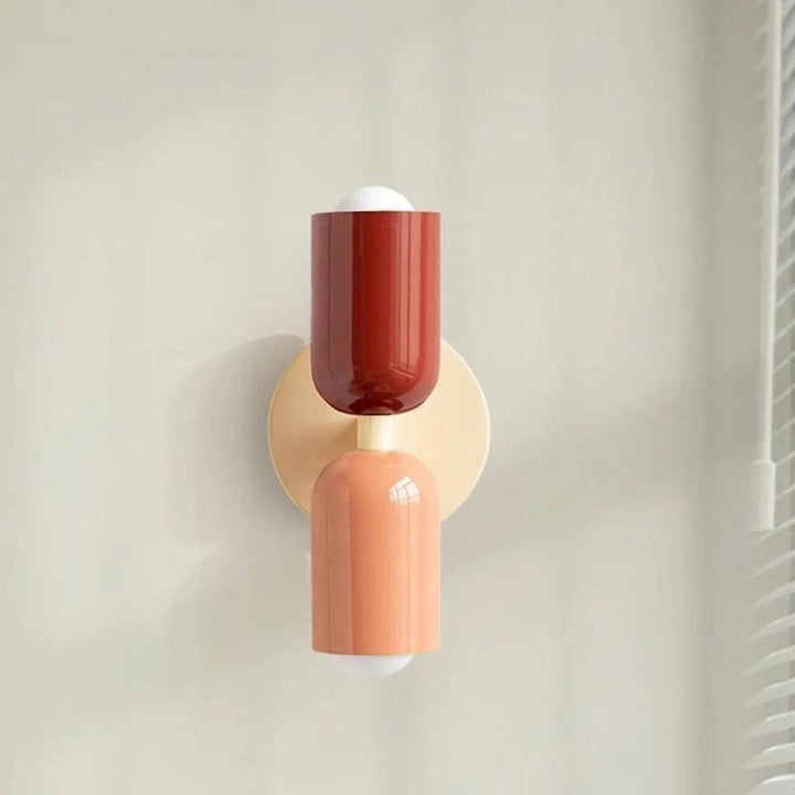 Modern Scandinavian double head wall lamp with ambient accent light.