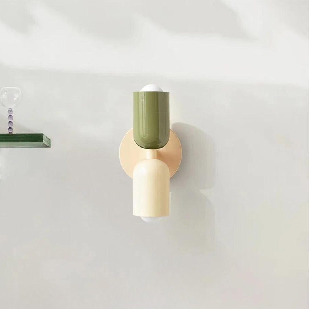 This double design wall lamp offers a sophisticated lighting accent.