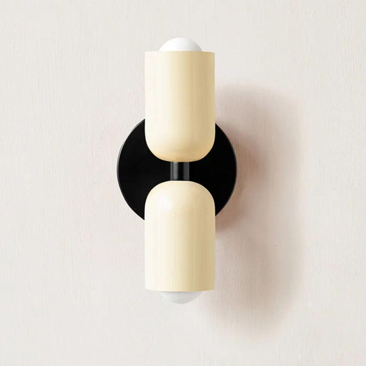 Enhance your decor with this ambient, double head wall lamp.