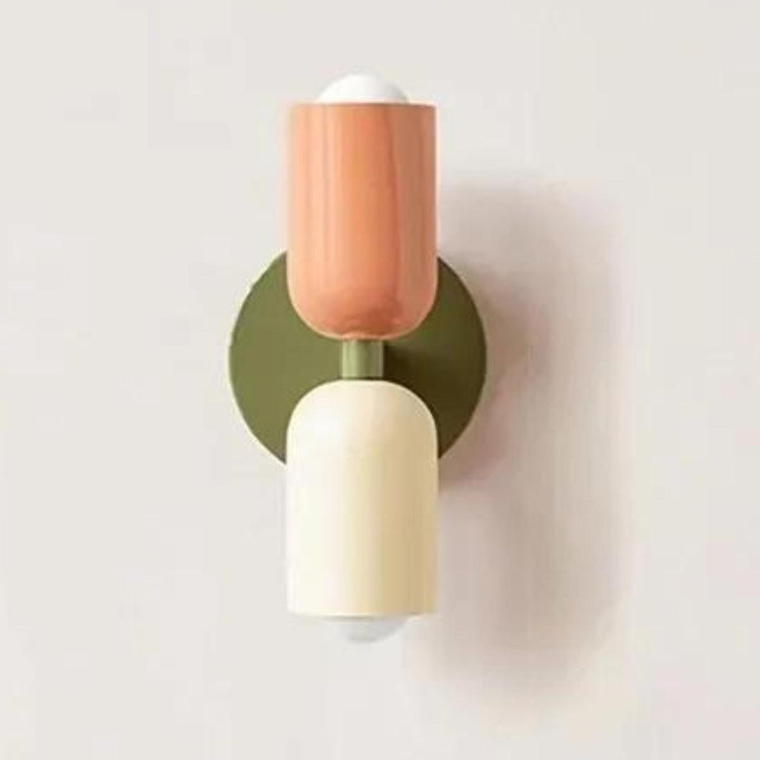 Sleek double head wall lamp with a contemporary Scandinavian look.