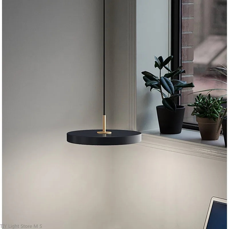 Minimalist Nordic style pendant lamp, perfect ceiling light for contemporary living rooms.