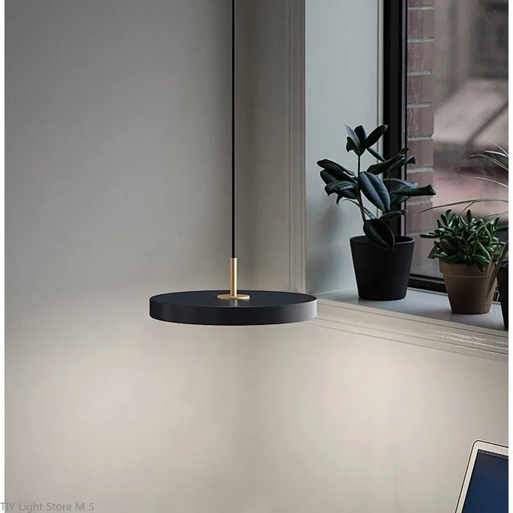 Minimalist Nordic style pendant lamp, perfect ceiling light for contemporary living rooms.