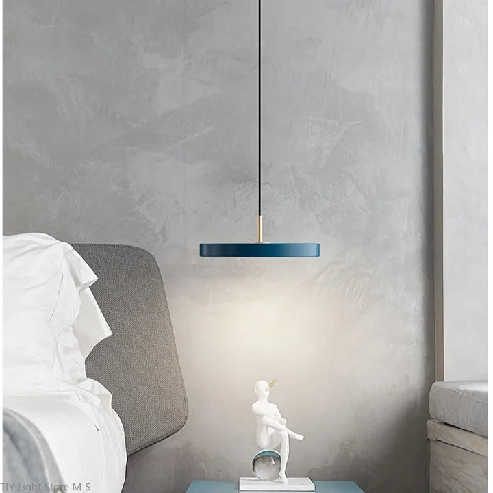 Sleek modern pendant lamp, ideal Scandinavian lighting for minimalist kitchens.