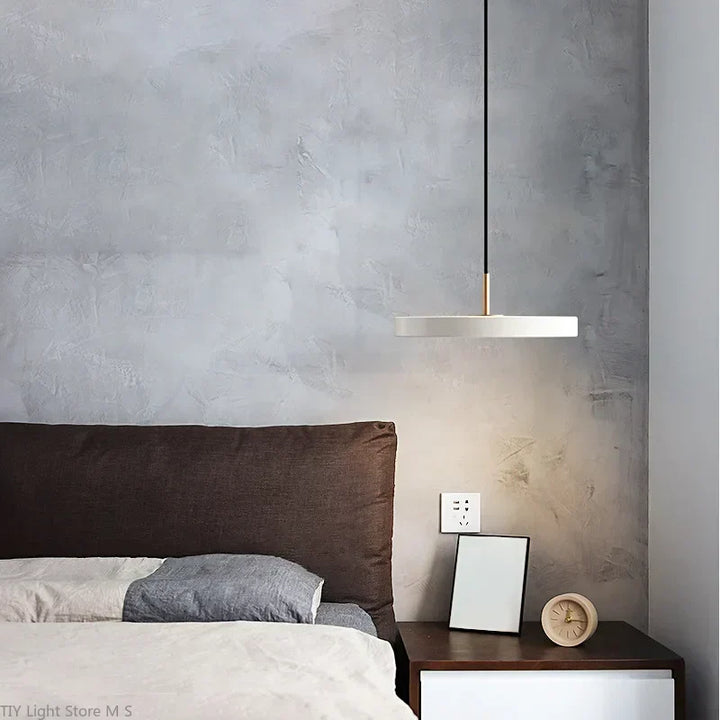 Nordic style pendant lamp with minimalist design, warm home decor lighting.