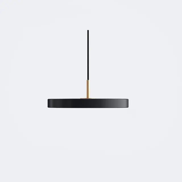 Contemporary Scandinavian pendant lamp, statement ceiling light for minimalist dining areas.