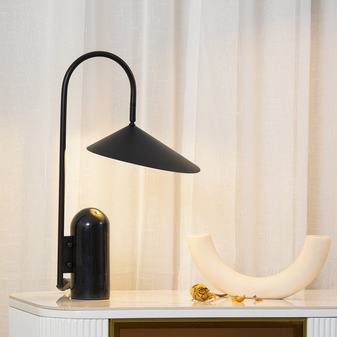 Beige bedside table lamp, Japandi decor, elegant arch, and heavy marble base.
