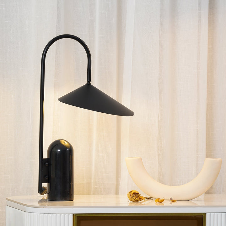 Beige bedside table lamp, Japandi decor, elegant arch, and heavy marble base.