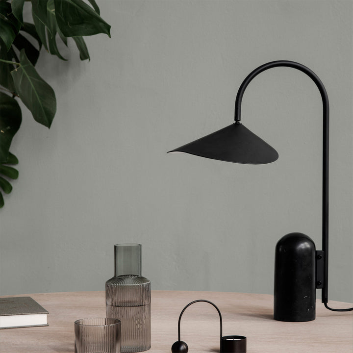 Japandi minimalist lamp, beige, sculptural arch & substantial marble base for bedrooms.