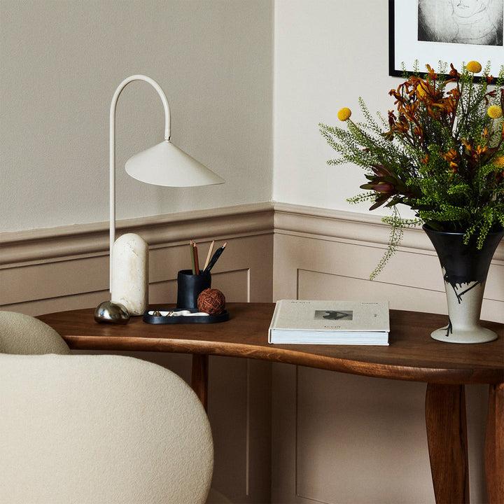 Contemporary beige lamp, minimalist, with an elegant arch & a refined marble base.