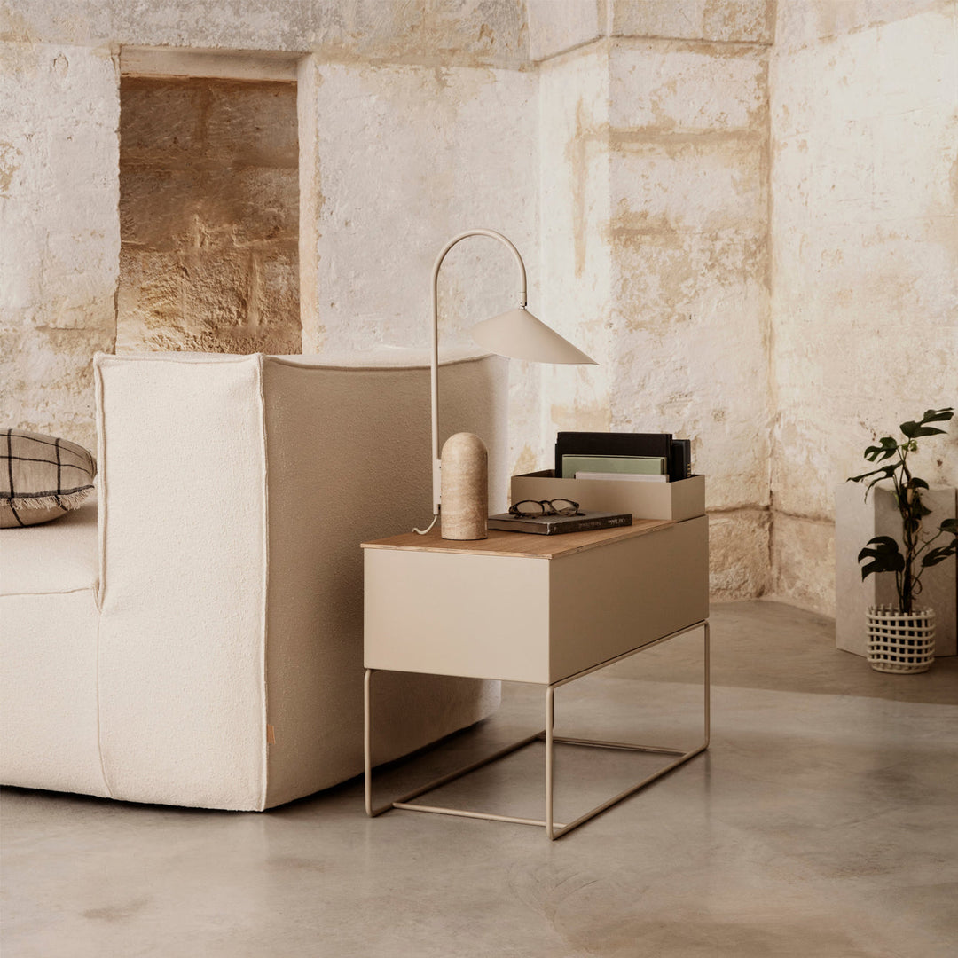Accent light, black, modern arched table lamp with a luxurious marble base.
