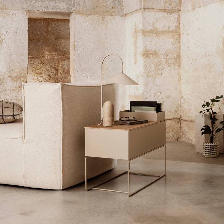 Accent light, black, modern arched table lamp with a luxurious marble base.