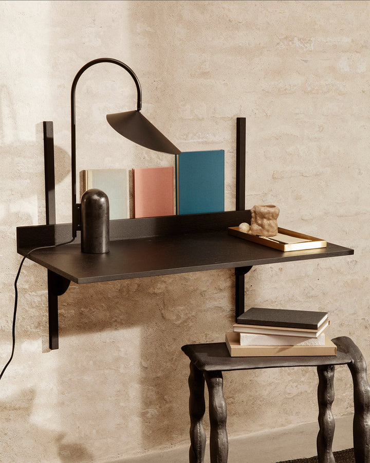 Beige modern lamp, minimalist, with a striking arched design & marble base.
