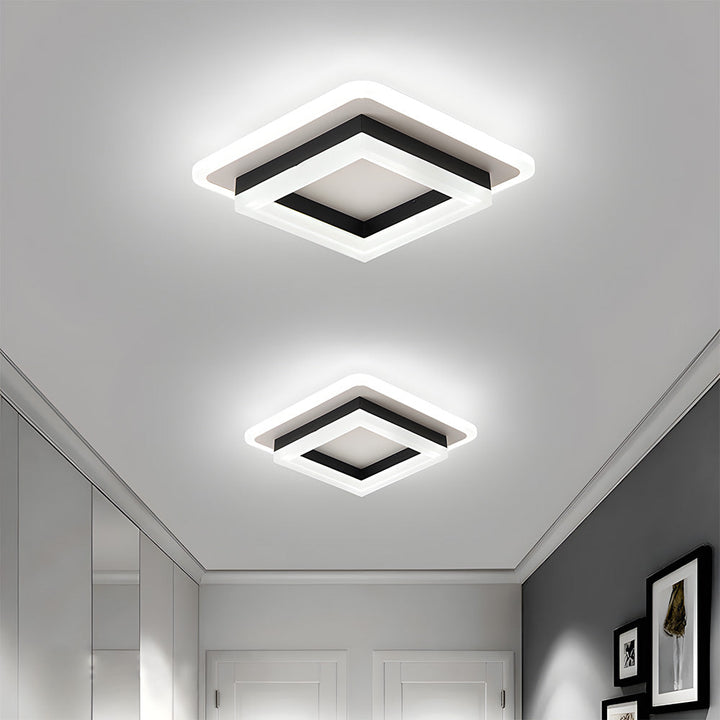 Square LED ceiling light, modern design for hallway & room lighting. Provides energy-saving LEDs.