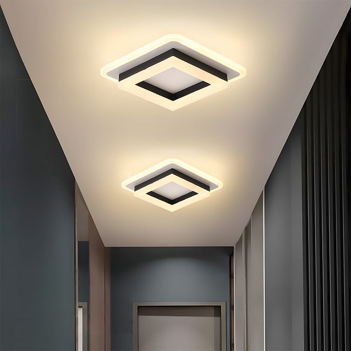Elegant modern LED ceiling light, enhances home decor with bright and efficient hallway illumination.