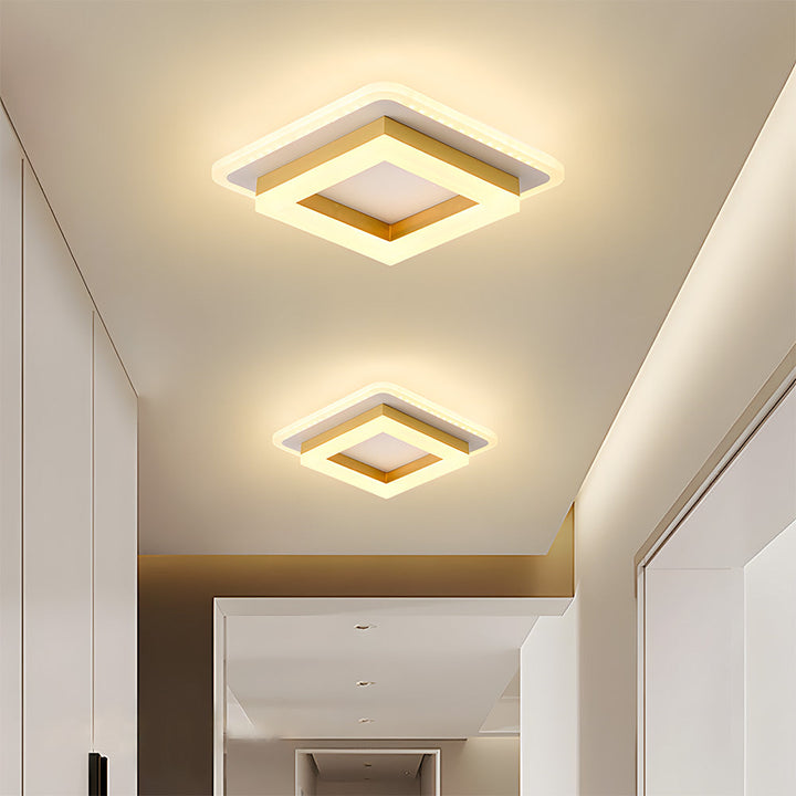 Energy-efficient LED ceiling light, a modern square design brightens hallways & living spaces.