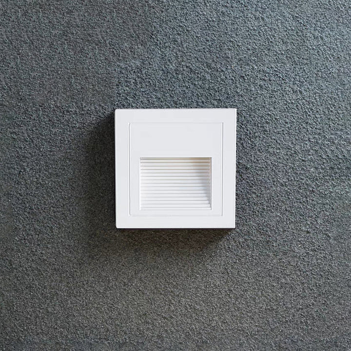 Outdoor step light with motion sensor, modern square design for deck & path.