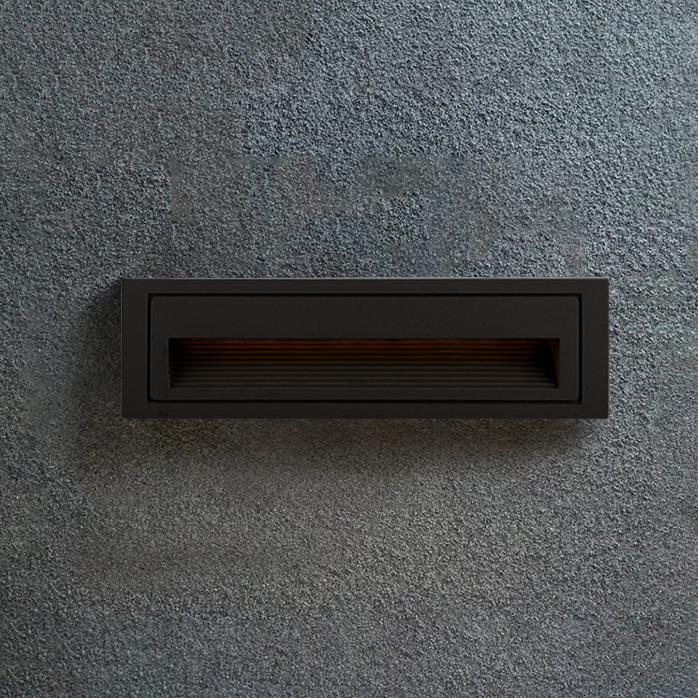 Sleek square LED step light for outdoor decks, enhancing path & garden safety.