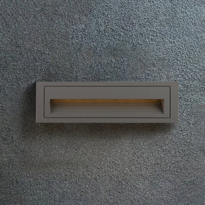 Hardwired square step light with modern design, ideal for outdoor deck lighting.