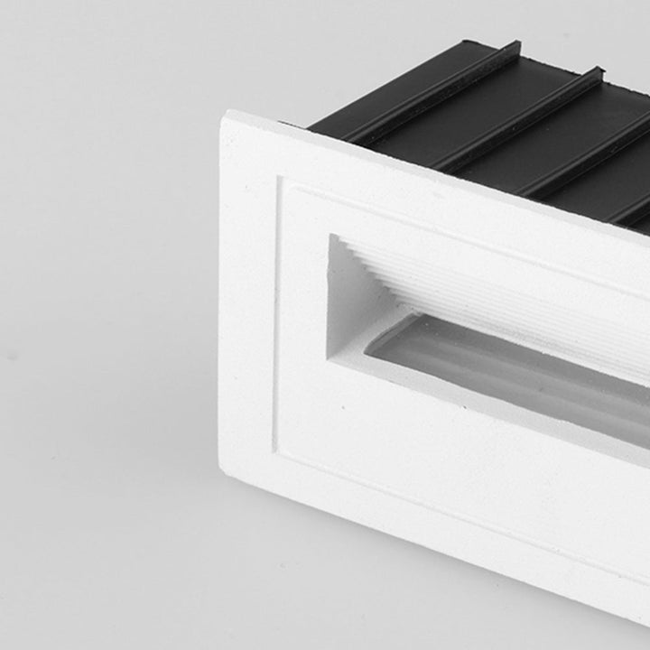 Bright square LED step light, modern design for deck, path & outdoor spaces.