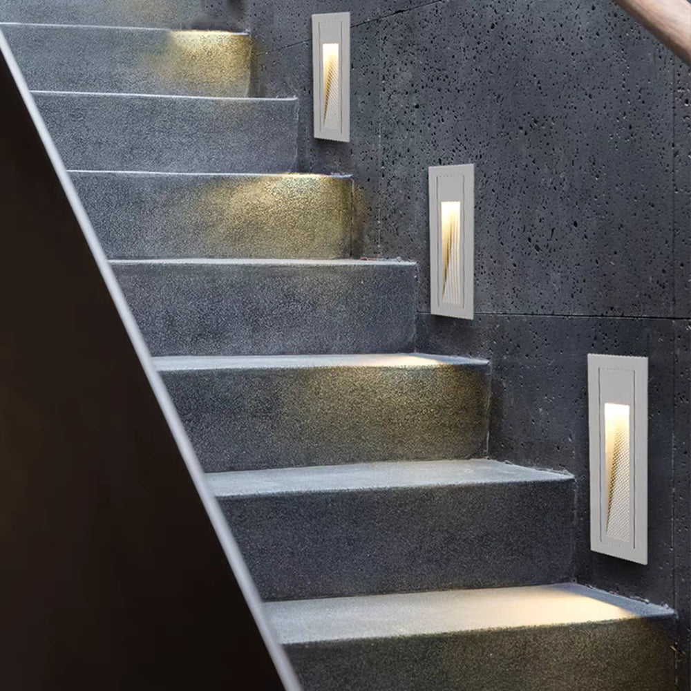 LED hardwired modern deck light, ideal for illuminating outdoor steps.