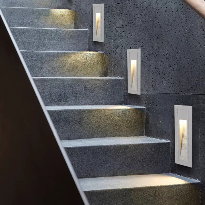 LED hardwired modern deck light, ideal for illuminating outdoor steps.