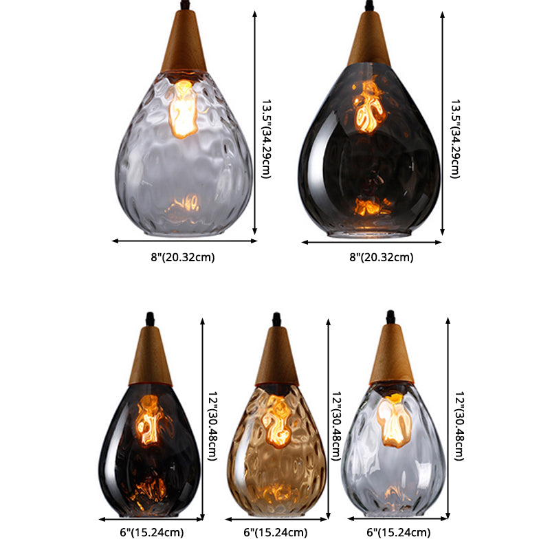 Home teardrop glass pendant light, contemporary ceiling fixture with sleek design.