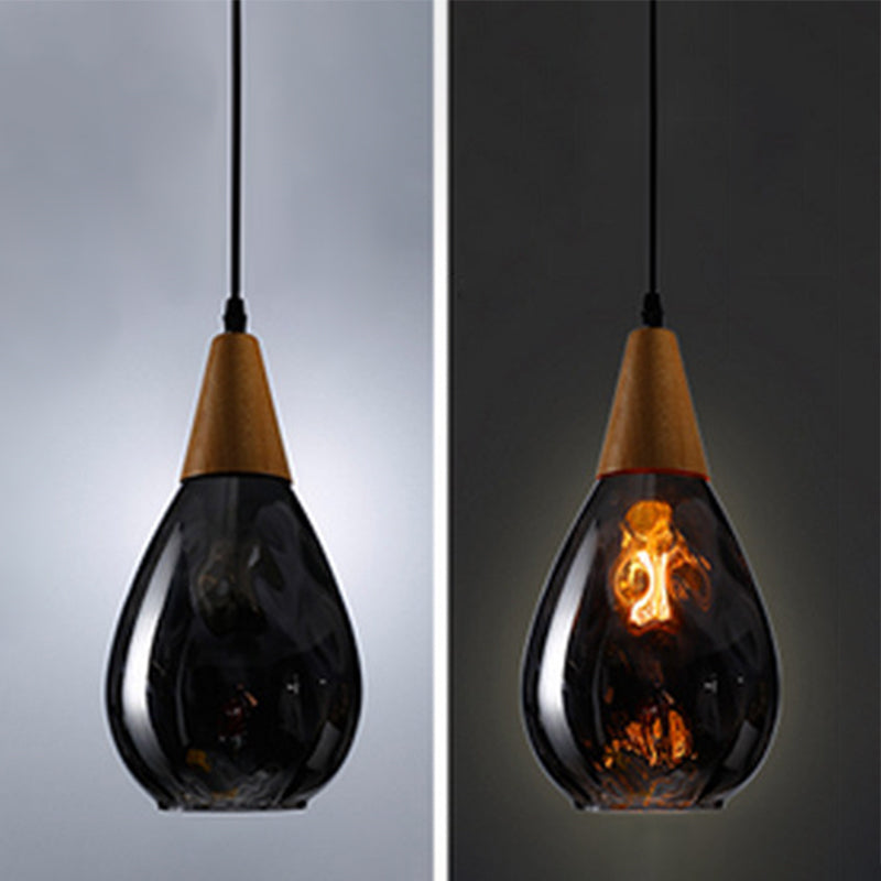 Teardrop glass ceiling lamp, a modern elegant pendant light fixture for any room.