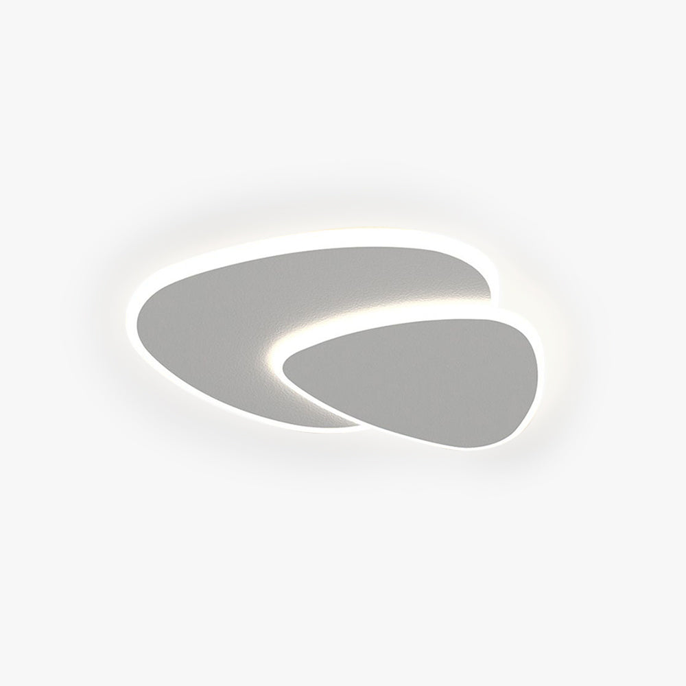 Modern triangular LED flush mount ceiling light, perfect for contemporary indoor spaces.