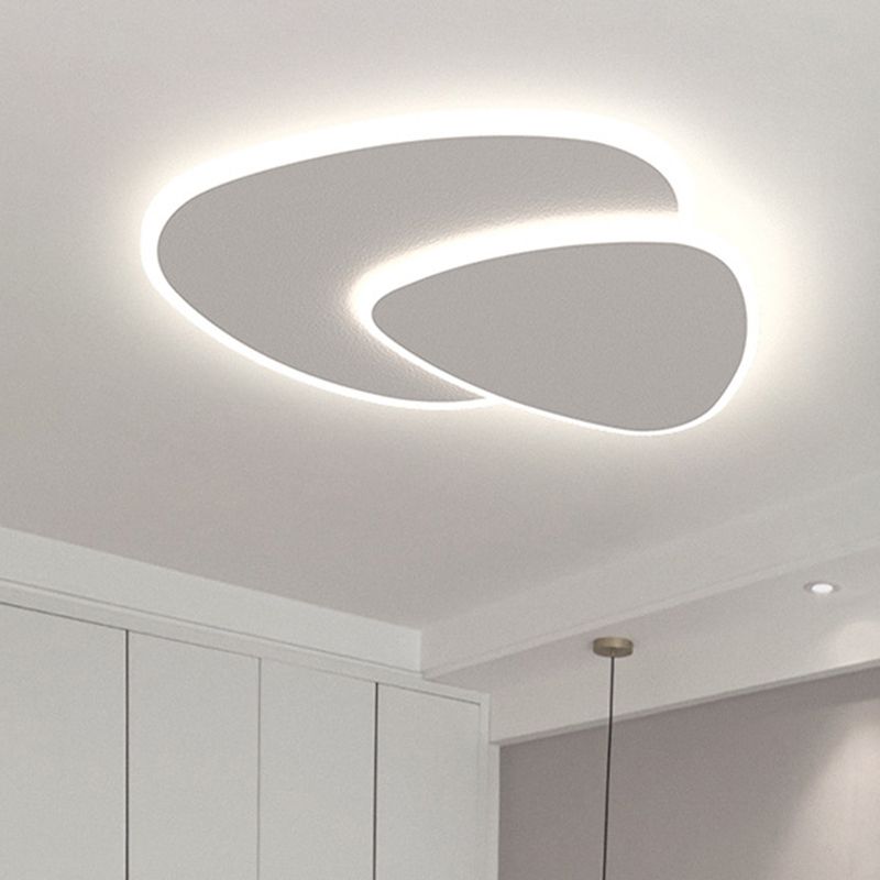 Contemporary triangle LED flush mount light, ideal for modern elegant interiors.