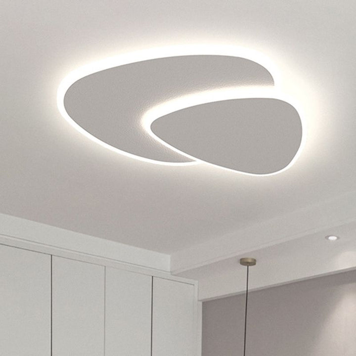 Contemporary triangle LED flush mount light, ideal for modern elegant interiors.