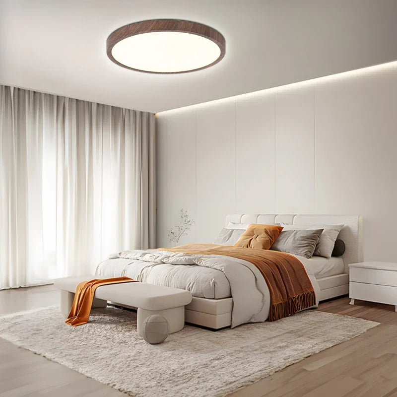 Stylish circular ceiling lamp featuring a warm walnut wood finish and bright LED illumination.