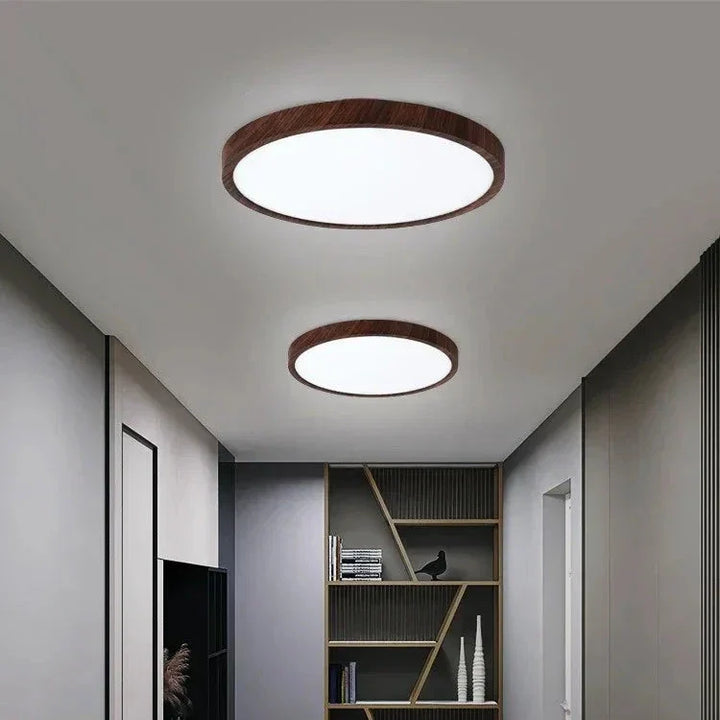 Elegant dining room ultrathin LED ceiling light; modern circular design with a beautiful walnut wood accent.
