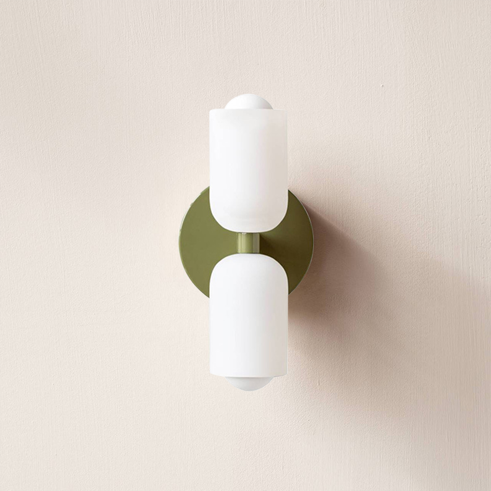 Elegant contemporary wall sconce, uplight downlight for sophisticated ambient interiors.
