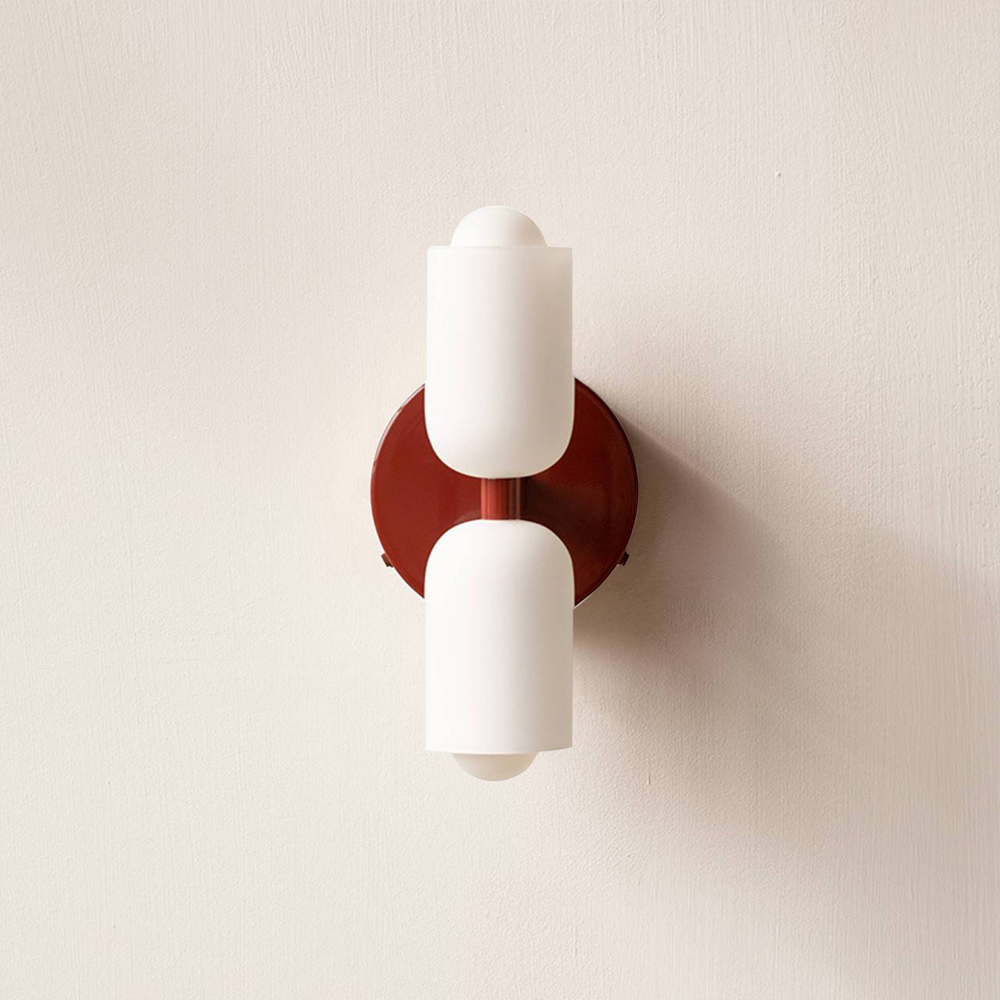 Minimalist modern wall light, casts subtle uplight & downlight for ambient atmosphere.