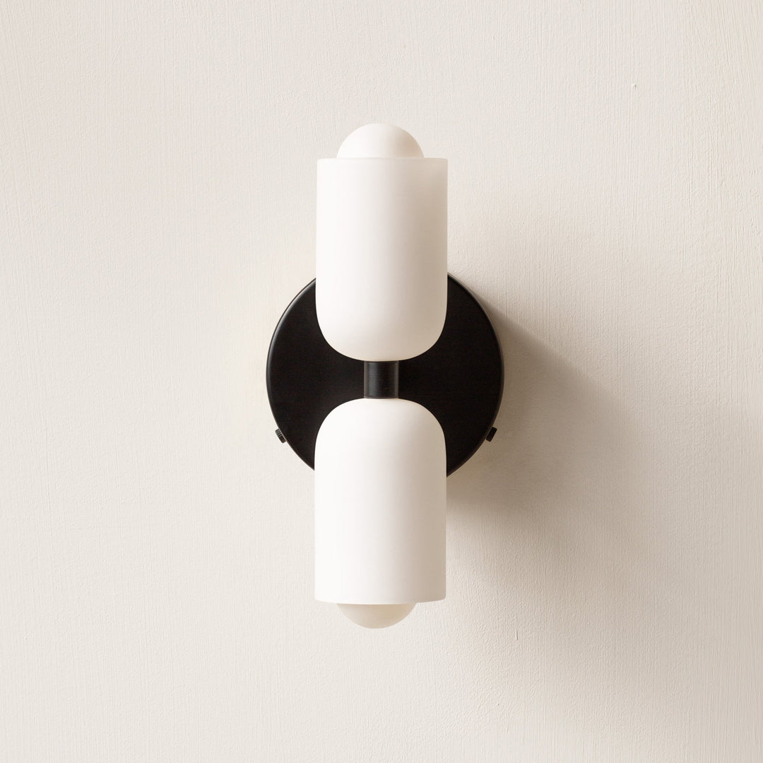 Decorative wall lamp with uplight & downlight, enhancing modern interior ambient spaces.