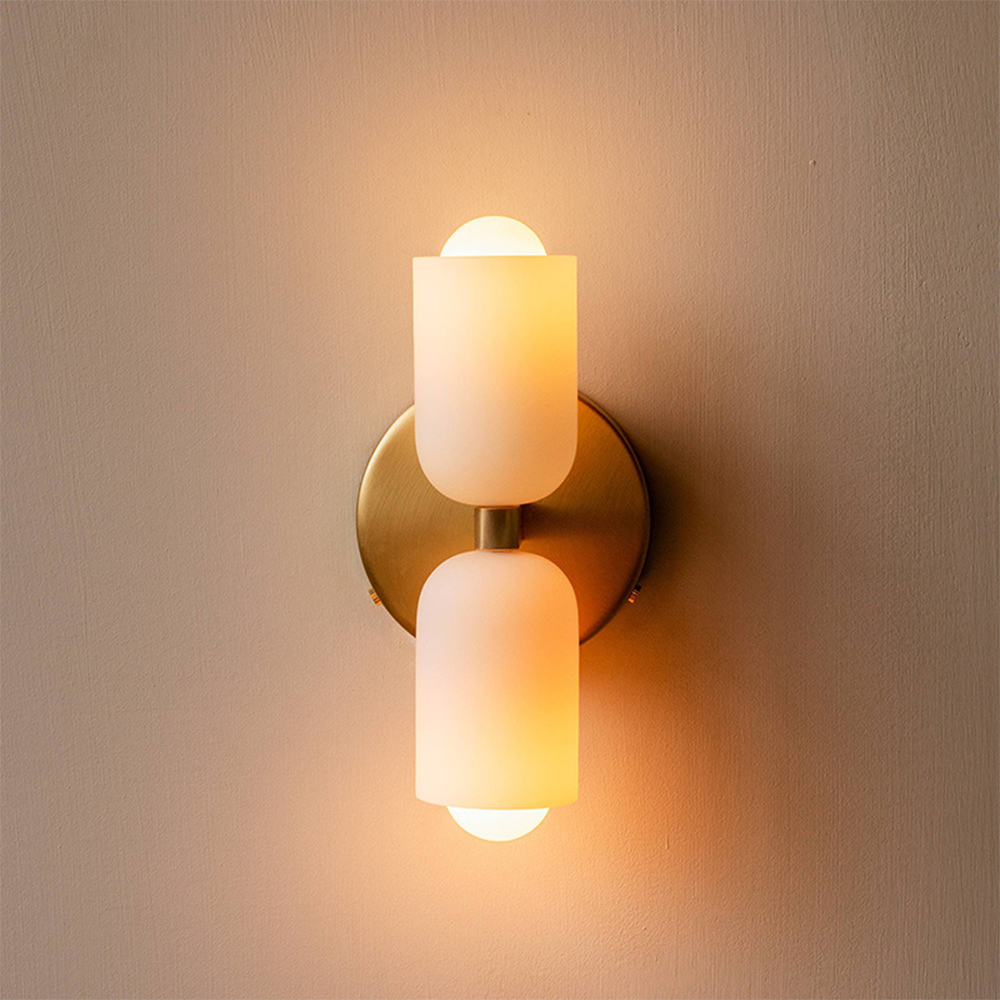 Sleek contemporary wall lamp with uplight & downlight for elegant home interior lighting.