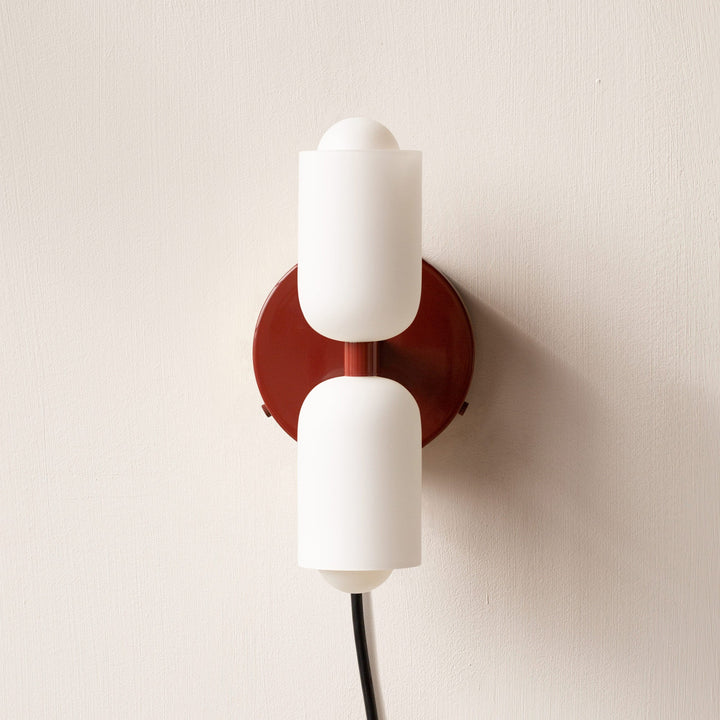 Stylish uplight downlight wall fixture, ideal for modern interior ambient lighting.