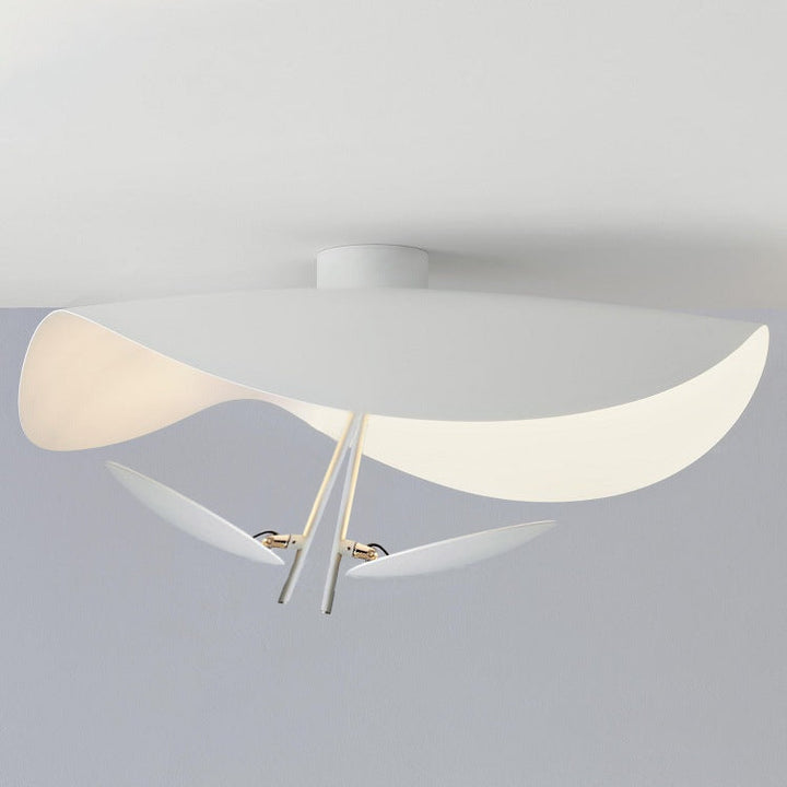 Gold Vellburn leaf pendant, modern sculptural ceiling fixture for elegant home decor.
