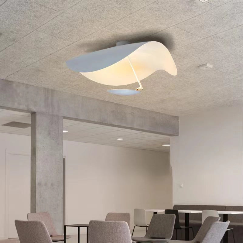 Black Vellburn leaf pendant light, sleek modern ceiling fixture, ideal for living rooms.